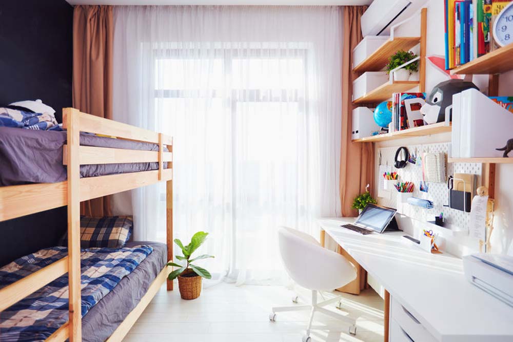 modern bright kids room with bunk bed and wall shelves